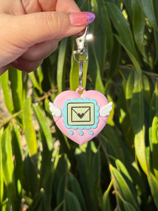 Mascota virtual corazón Rosada