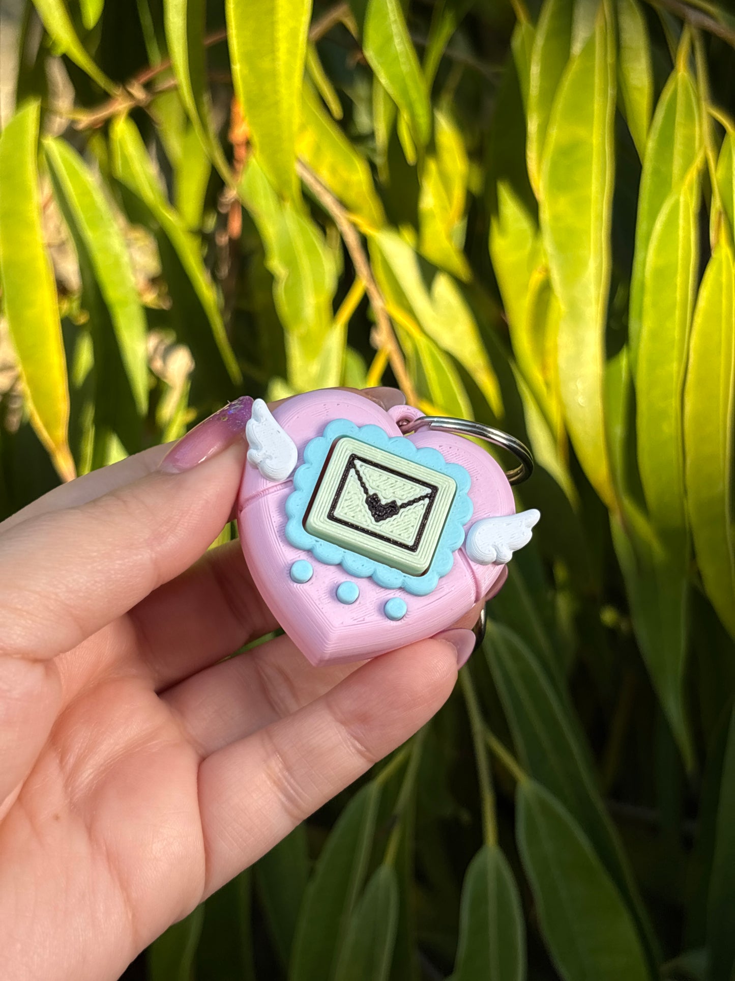Mascota virtual corazón Rosada